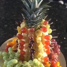 70's & 80's style buffet food, cheese and pineapple on sticks with fresh fruit