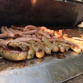 Shropshire Hills Catering Ltd homemade sausages on BBQ
