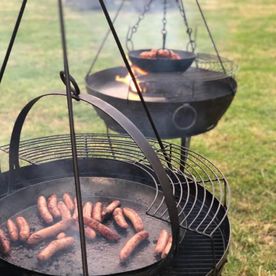 Shropshire Hills Catering barbecue sausage using our new Kadai fire-bowls